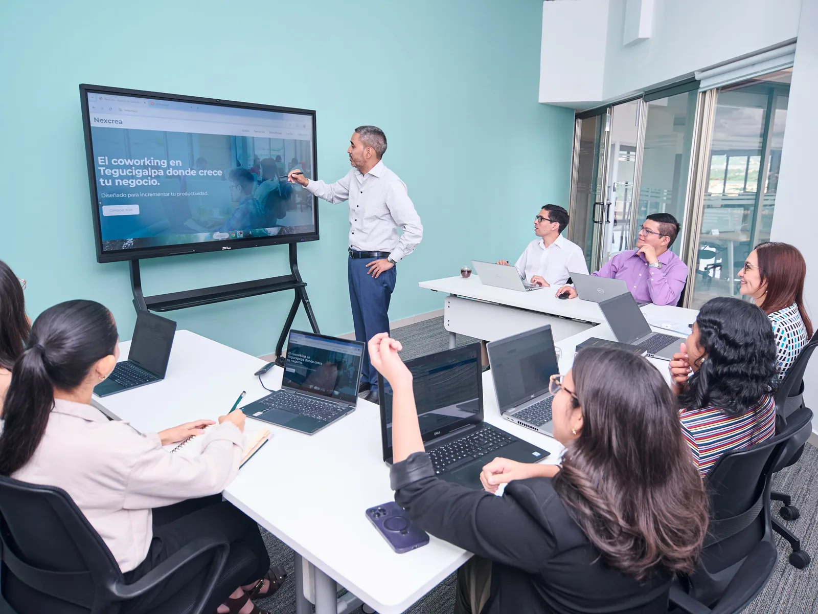 Instructor presenting technical training material to a seated group